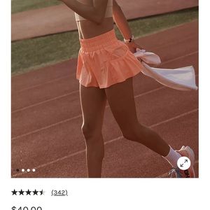 Set of 2 “Get your flirt on” free people movement activewear shorts. Size XS.